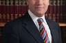 Attorney Andrew May in his firm's library.