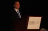 John Leighton speaks to attendees at the American Association for Justice Winter Convention in February 2013.