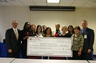 Attorney Steve Jaffe, far right, presented a $100,000 check to the Alzheimerâ€™s Association, Southeast Chapter. The cy pres award was a result of a precedent setting long-term care insurance class action law suit.