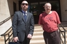 Left to right: Rob Serafinowicz and Peter Nestir outside the New Haven courthouse in July 2010, the day Nestir's brother, Bruno, entered a guilty plea to the theft of paintings from the Yale Art Gallery.