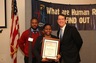 Human Rights Day, December, 2012; Forum on Education and Responsibility; Youth for Human Rights Director for Africa Jay Yarsiah, Pasadena team leader Khadejah Ray with Congressional certificate, and Tim Bowles
