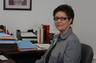 Lucy Zapata at her desk at the Law Offices of Pinizzotto~Hill, L.L.C.