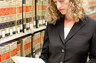 Attorney Kate Mayer Mangan conducting legal research.
