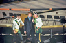 New York Chiefs Roller Derby Television Announcer Donald Drewry Interviewing #25 Mike Gammon and #22 Bill Groll at the New Madison Square Garden March 1975