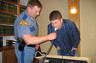 A breath sample is being submitted by a subject participating in a Drinking Lab conducted at Woods & Brangwin, PLLC.