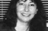 Another sterile black and white photo.  You are just as likely to meet Michelle in a business suit as you are to have her greet you in a pair of Wranglers and boots.