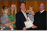 Originally from Canada, I was sponsored by my wife Jenni for a green card in 2001.  I became a U.S. citizen in October 2008 and above is a picture of me (and family) with Judge Piester who presided over my oath ceremony.