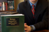 Posing with a copy of the Michigan OWI Handbook for lawyers that I wrote in 2009 for West Publishing. This was for the cover of MI Lawyers Weekly. The MLW featured a case of mine that changed the way the Michigan State Police analyzes blood in OWI cases.