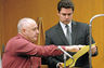 Cross-examining a witness.