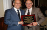 Attorney Todd Greenberg, president of the Assistant District Attorney's Association of Queens County, presents award to Queens County Supreme Court Justice Richard Buchter at a meeting of the Association.