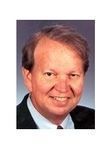 Jon L. Mills
