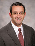 Michael A. Okaty
