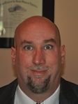 Gregg R. Brennan