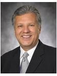 Gregory A. Vega