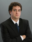 Justin L Swidler