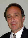 Joseph L Basralian