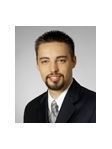 Eric J Ball