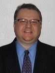 Christopher J Brester