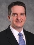 Curtis J Busby