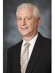 M. Richard Komins