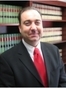 Kenneth A White