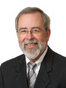 Brewer Trusts Attorney Calvin E. True