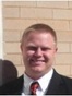 Justin Tharpe Holcombe