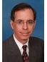 Freeport Contracts / Agreements Lawyer James M. Dennis