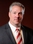 Douglas J Olcott